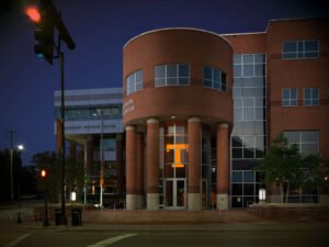 Architectural twilight exterior photograph of the Brenda Lawson Center rotunda and Anderson Training Center facade by Dwayne Hickson, Graphic Productions in Knoxville, TN.